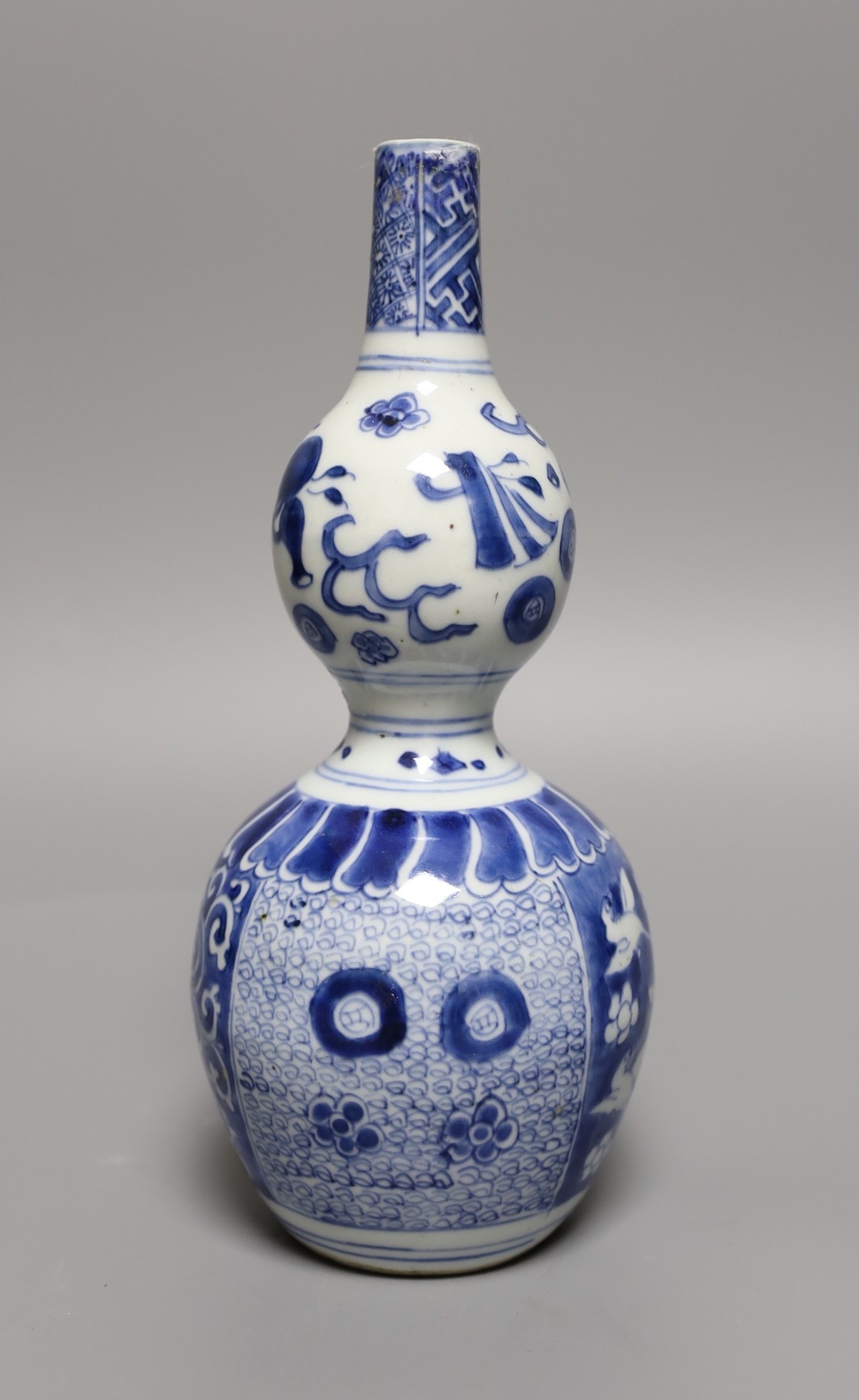 A Chinese blue and white double gourd vase, 23cm